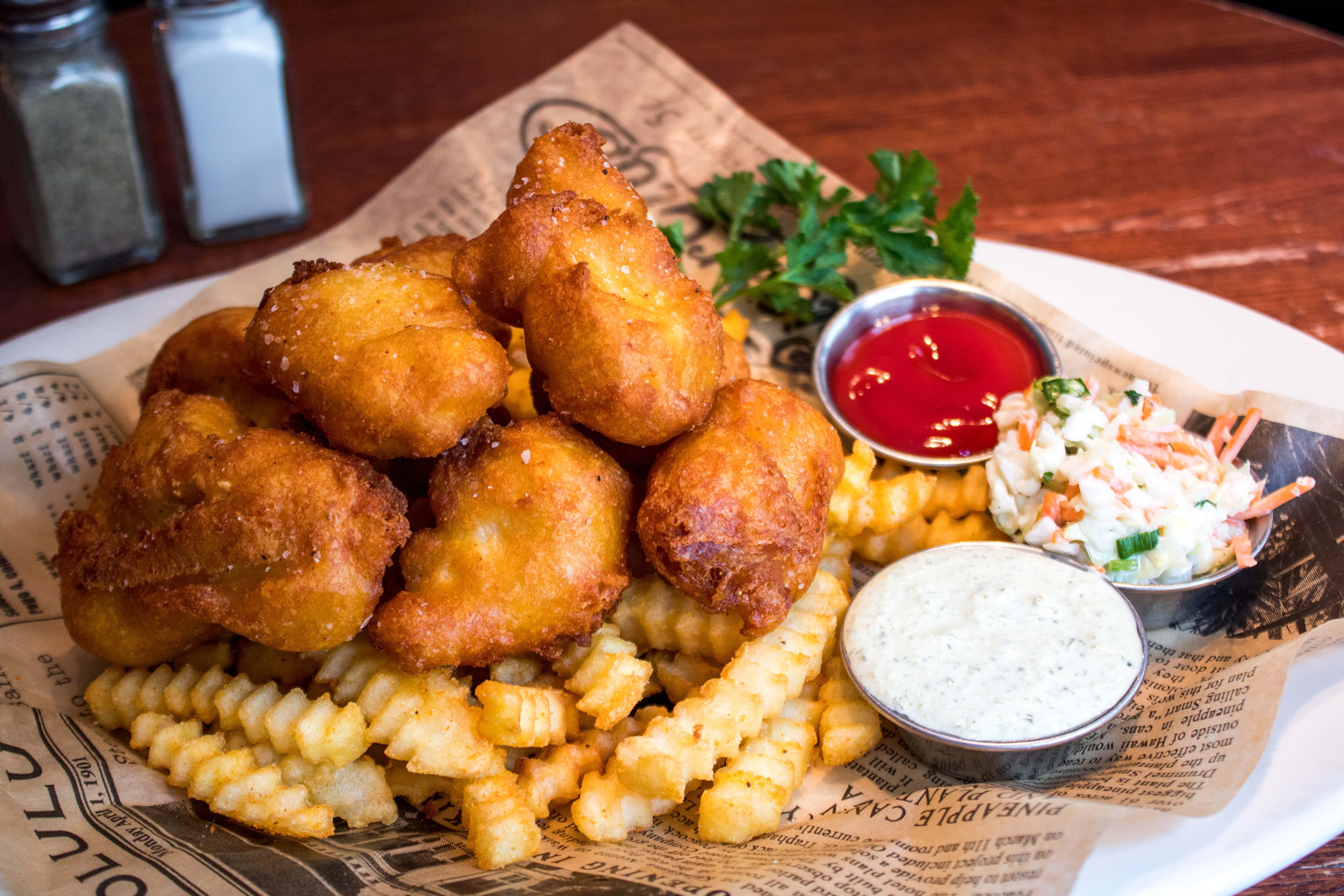 fried walleye balls with salt and pepper shaker